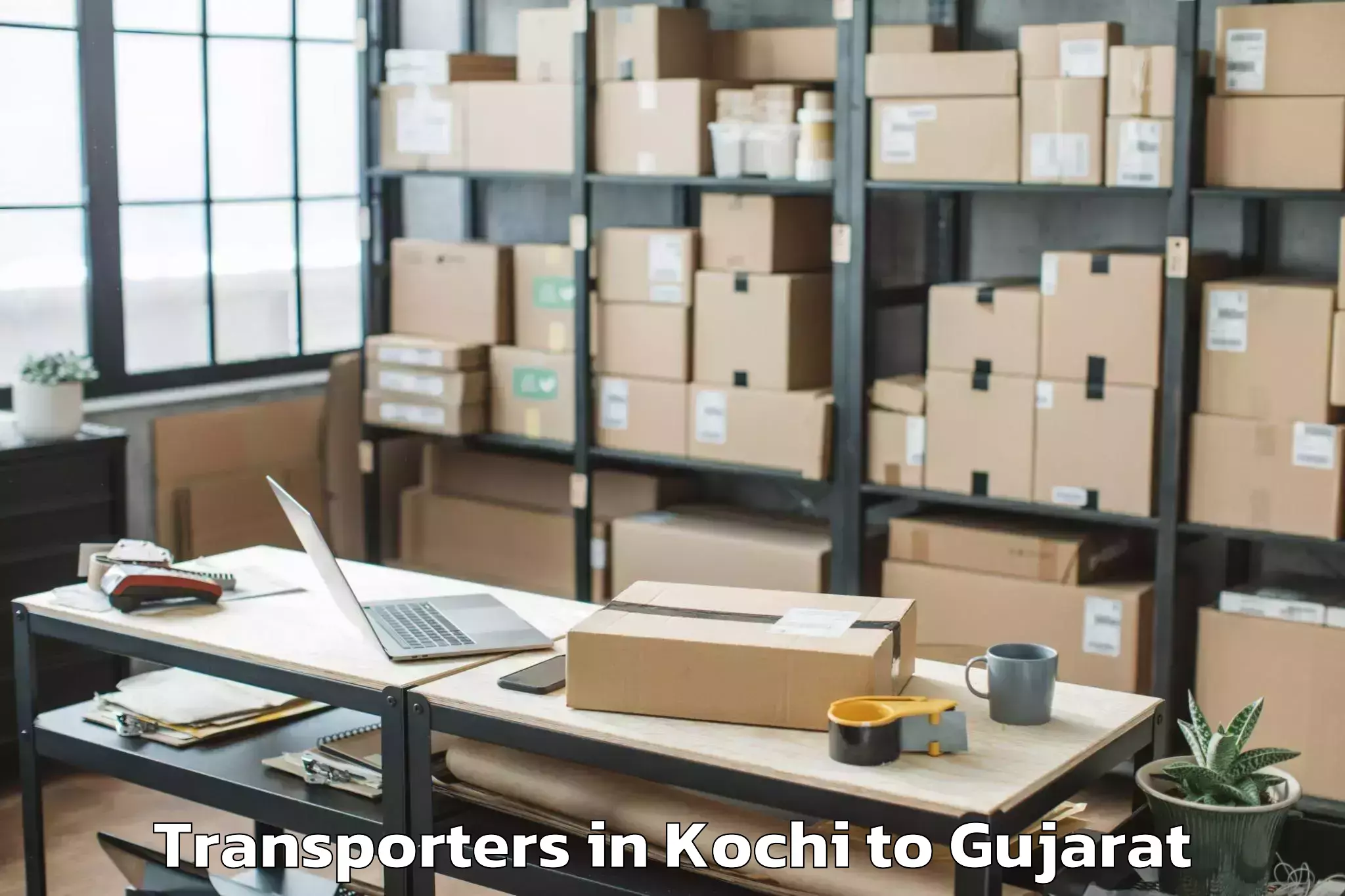 Book Kochi to Gusar Transporters Online